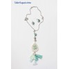 Collar largo bordado y borlas
